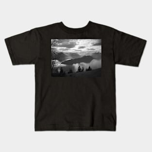 Hills reflected on a lake in Switzerland Kids T-Shirt